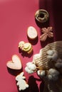 Trendy Easter background with shadows. Traditional cookies with glazing, Easter food