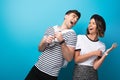 Trendy, excited man and woman laughing together Royalty Free Stock Photo