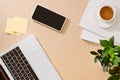 Trendy feminine home office workspace. White office desk. Laptop, coffee cup and phone, notebook, pencil. Flat lay, top view, copy Royalty Free Stock Photo