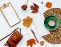 Trendy flat lay composition with coffee cup and autumn leaf