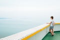 Trendy girl posing in the sea background Royalty Free Stock Photo