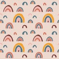 Trendy hand drawn seamless pattern with doodle rainbows. Colorful retro abstract geometric design. Repeating tile for