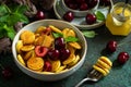 Trendy home breakfast. Mini pancakes, honey and cherries Royalty Free Stock Photo