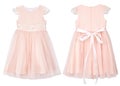 Trendy lace Girl`s peach colored party dress isolated
