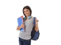 Trendy latin student girl holding notepad folder and book carrying backpack smiling happy Royalty Free Stock Photo