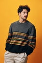 Man fashion trendy portrait background orange sweater