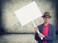 Trendy man holding protest sign Royalty Free Stock Photo