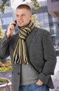 Trendy man using mobile phone Royalty Free Stock Photo