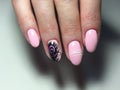 Trendy manicure with bright feather design