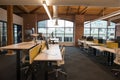 Trendy modern open concept loft office space with big windows, natural light and a layout to encourage collaboration Royalty Free Stock Photo