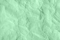 Crumpled mint colored craft paper