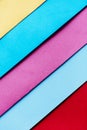 Trendy pastel colors in geometry shape flat lay. Colorful rainbow paper creative linear background