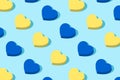 Trendy pattern of hearts in alternating blue and yellow colors of the Ukrainian flag.