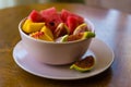 Trendy pink buddha bowl of fruit salad