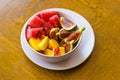 Trendy pink buddha bowl of fruit salad