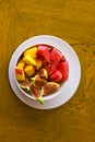 Trendy pink buddha bowl of fruit salad