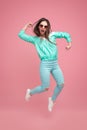 Expressive hipster woman jumping up Royalty Free Stock Photo