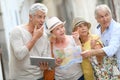 Trendy senior people travelling and visiting monuments Royalty Free Stock Photo
