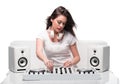 Trendy DJ dressed in white mixing music