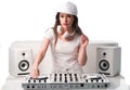 Trendy DJ dressed in white mixing music