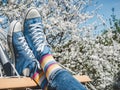Trendy sneakers and bright socks. Men`s and women`s style Royalty Free Stock Photo
