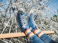 Trendy sneakers and bright socks. Men`s and women`s style Royalty Free Stock Photo