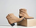 Trendy suede boots. fashion female shoes