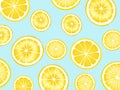 Trendy sunlight Summer pattern made with yellow lemon slice white background. Minimal summer lemon pattern Royalty Free Stock Photo