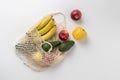 Trendy textile cloth bag with fruit, reusable material for natural products