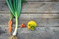 Trendy ugly vegetables on barn wood