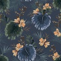 Trendy Vector seamless dark tropical pattern on dark blue, exotic foliage,monstera leaf, flowers, palm leaves, and blooming garden