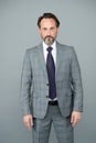 Trendy wardrobe perfect for his style. Mature man in formal style. Stylish lawyer grey background. Business dress code