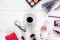 Trendy woman desk with cosmetic, lavender, coffee white background top view mockup