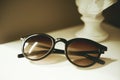 Trendy womens sunglasses still life in minimal style. Summer fashionable accessories. Optic store discount, sale. Close