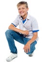 Trendy young boy posing in casuals Royalty Free Stock Photo