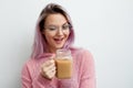 Trendy young woman drinking coffee latte. Royalty Free Stock Photo