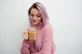 Trendy young woman drinking coffee latte. Royalty Free Stock Photo