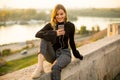 Trendy young woman listening music from smartphone outdoor Royalty Free Stock Photo