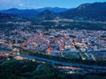 Trento city aerial panoramic view. Night city lights view from above in Trento city in Trentino Alto Adige in Italy Royalty Free Stock Photo