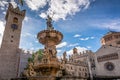 Trento city: main square Piazza Duomo, with clock tower and the Late Baroque Fountain of Neptune. City in Trentino Alto Adige, nor Royalty Free Stock Photo