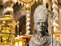 TRENTO, Italy - february 21, 2018: bronze statue of San Vigilio, patron of trento, in the Cathedral of San Vigilio or Cathedral of Royalty Free Stock Photo