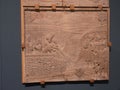 TRENTO, ITALY - JUNE, 1, 2019: carved bas relief of the disciples of christ pulling in a fishing net at buonconsiglio