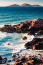 Three islands off the coast of Mazatlan, Mexico with deep blue Pacific waters