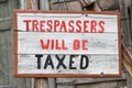 Trespassers will be Taxed sign