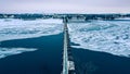 Winter Wisconsin trestle trail bridge over lake Royalty Free Stock Photo