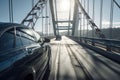 trestles and cables stretching across a bridge, with cars passing below Royalty Free Stock Photo