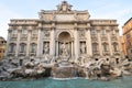Trevi Fountain and building facade exterior with columns and pediment in Rome, Italy Royalty Free Stock Photo