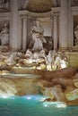 Trevi Fountain in old Rome, lit up at night