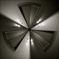 Tri-sided distorted door and lights in a circle