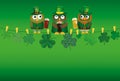 Tri sovi na verevke s Three owls in national dress drinking beer in glasses sitting on a rope. Clover